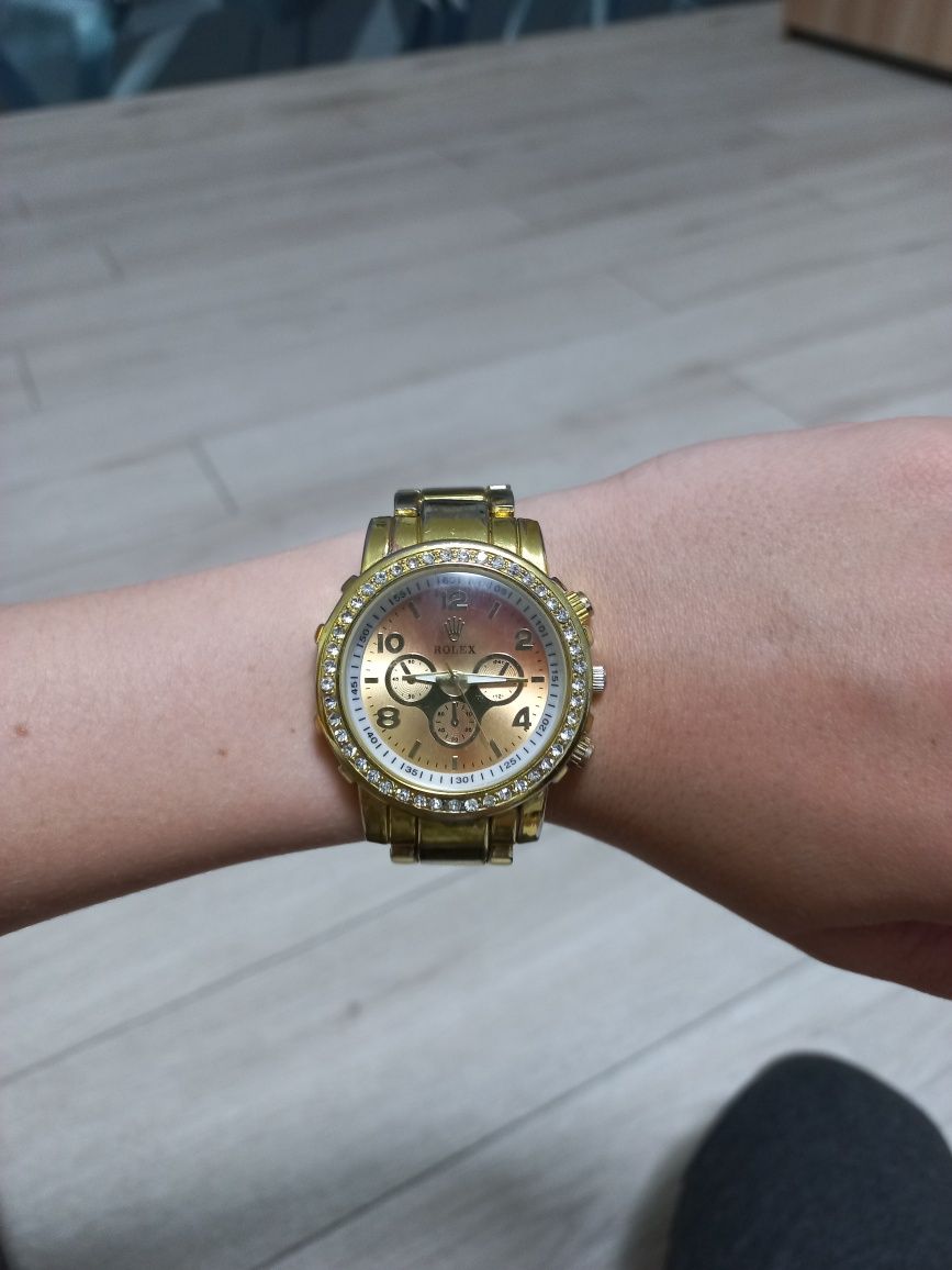 Жіночий годинник Rolex.