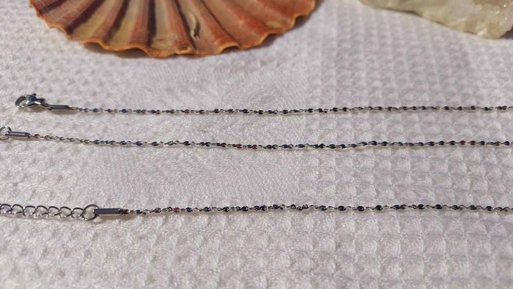 Conjunto de colar e pulseira de aço inoxidável prateado