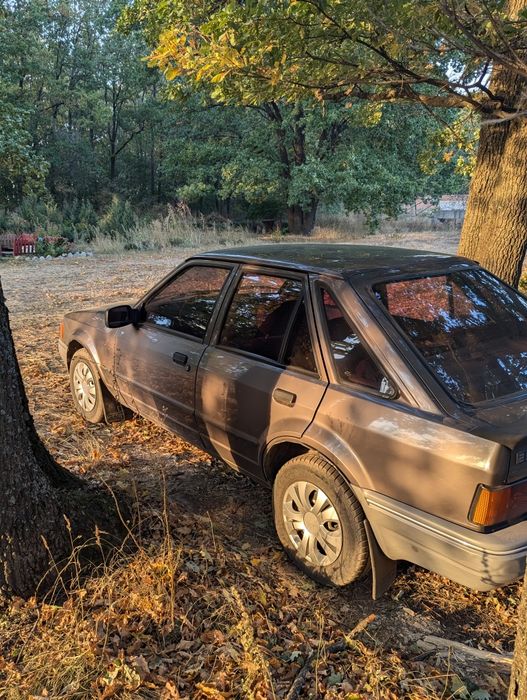 Ford Escort 1.4 газ бензин