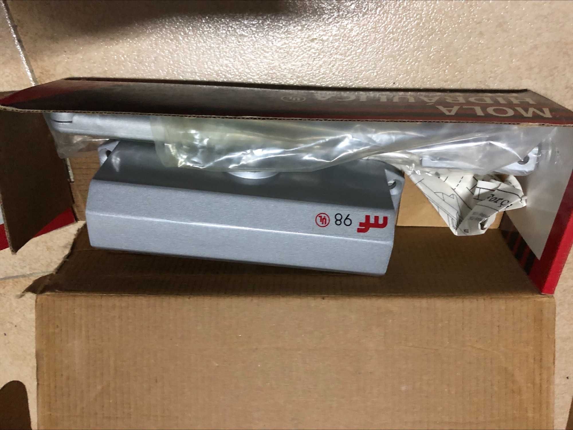 Mola hidráulica para porta