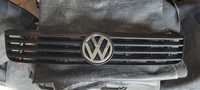 Grelha com símbolo vw passat