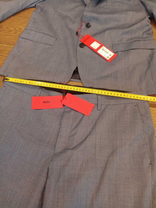 Hugo Boss garnitur męski niebieski elegancka jednorzędowy rozmiar 54