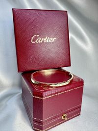 Золотий браслет у стилі Cartier