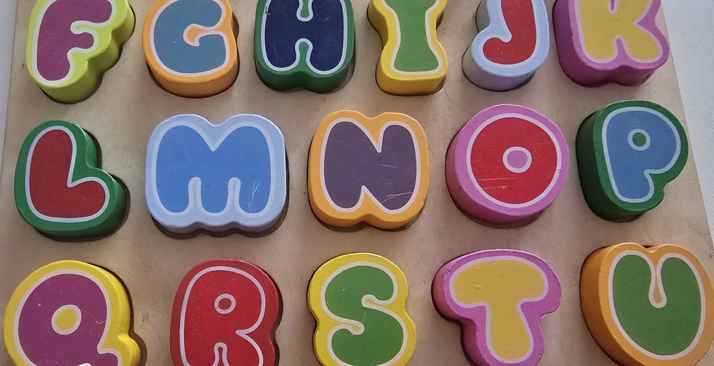 Puzzle drewniany alfabet montessori