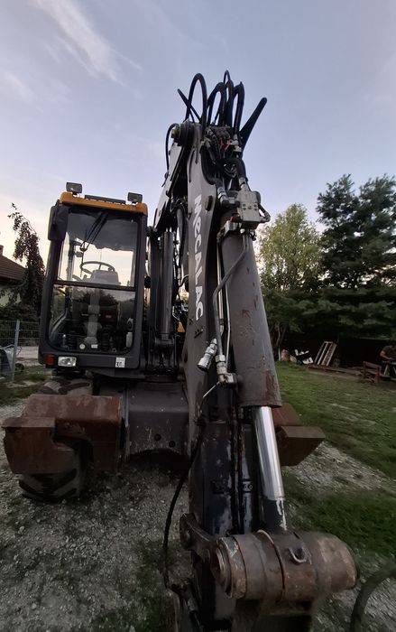 Usługi koparką Mecalac 12mtx