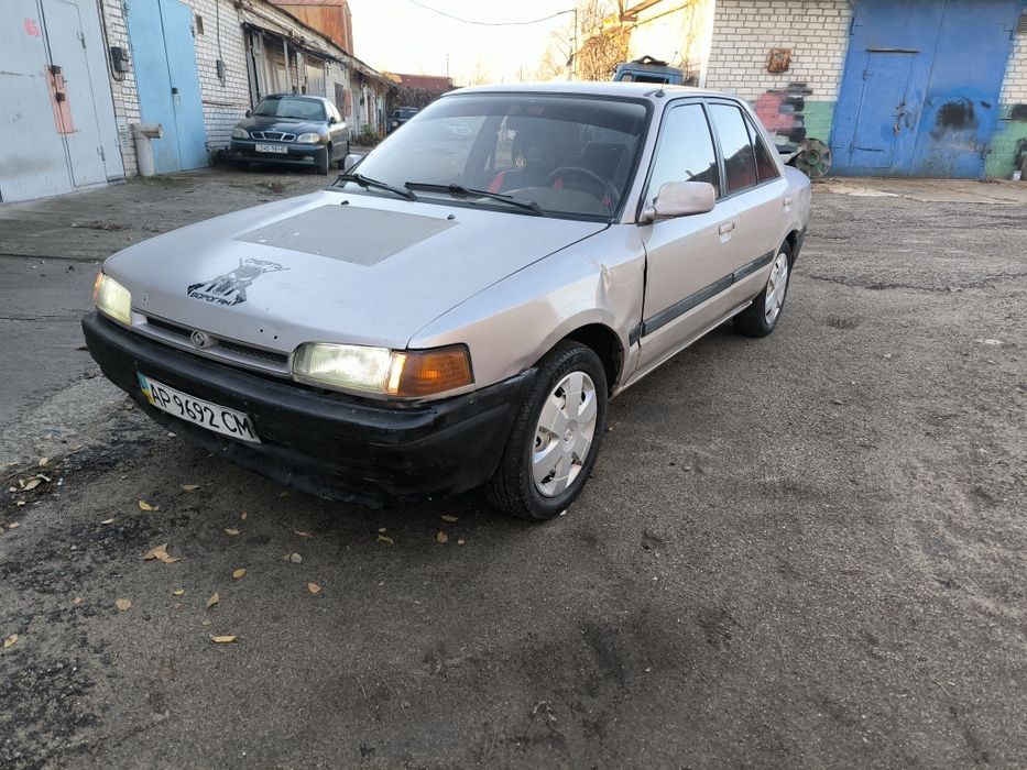 Продам Mazda 323.  Газ/Бенз. Гур.
