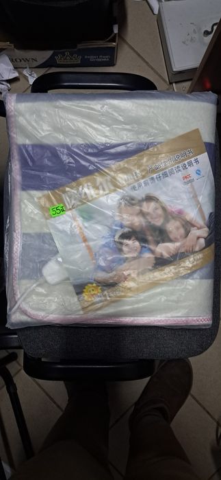 KOC ELEKTRYCZNY mata grzewcza 150x70cm 60W prześcieradło z pilotem