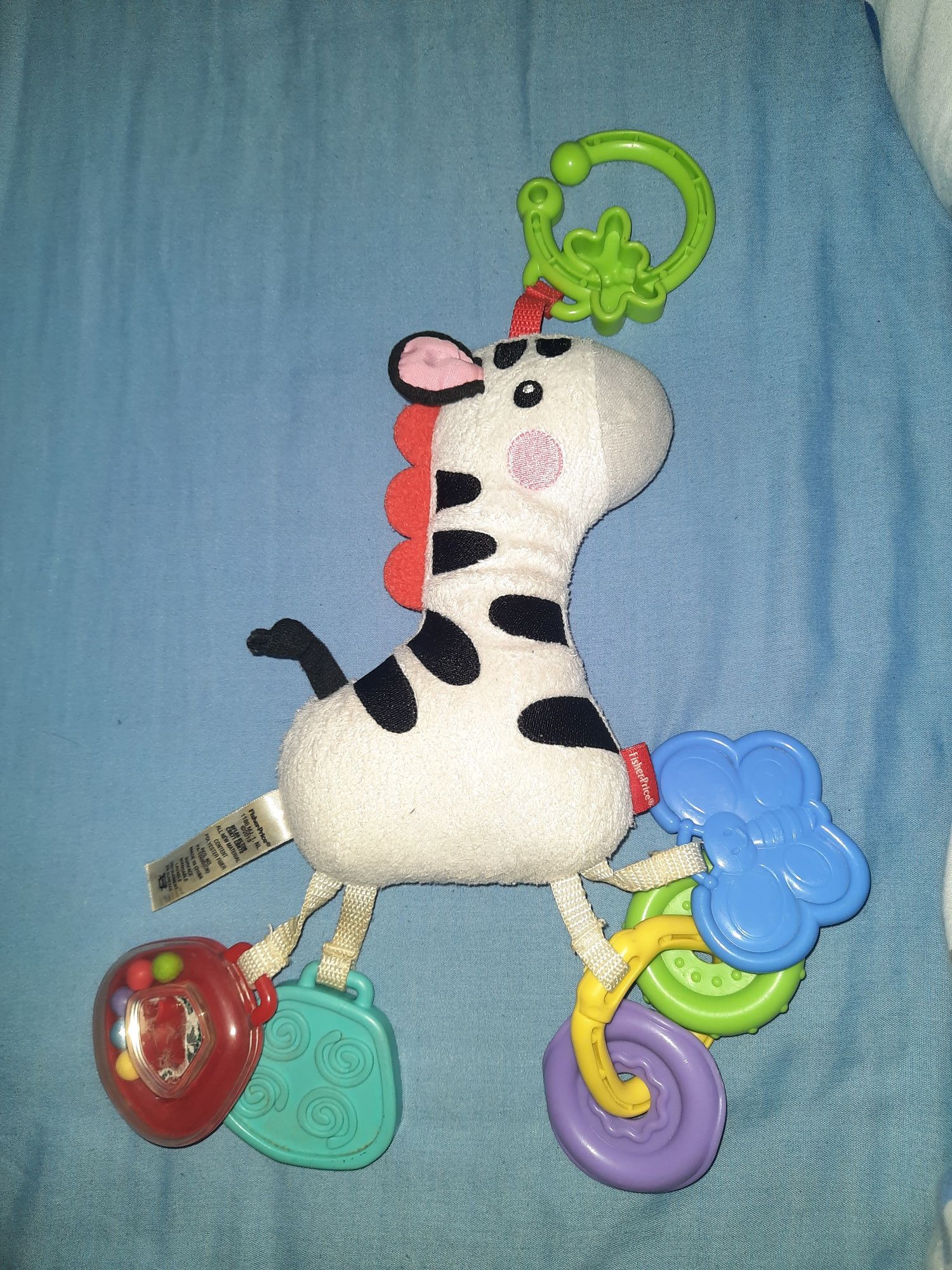 Fisher price zebra grzechotka.