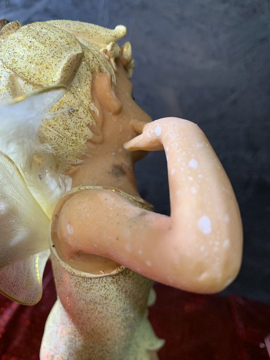 Ангел, Уцінка статуетка