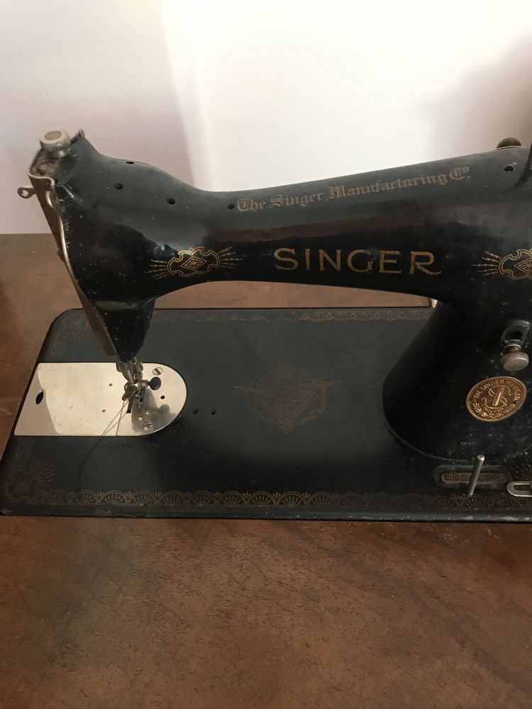 Maquina de costura marca singer