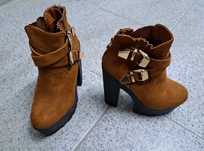 Botas de salto alto