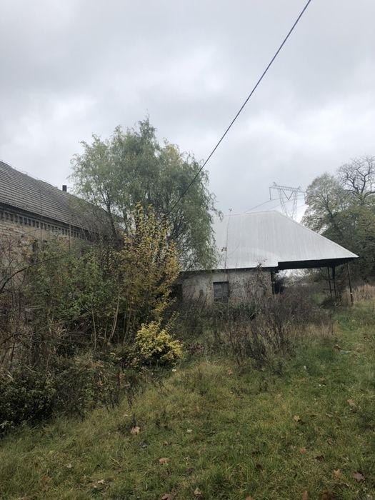 Sprzedam działkę z budynkami (PGR)