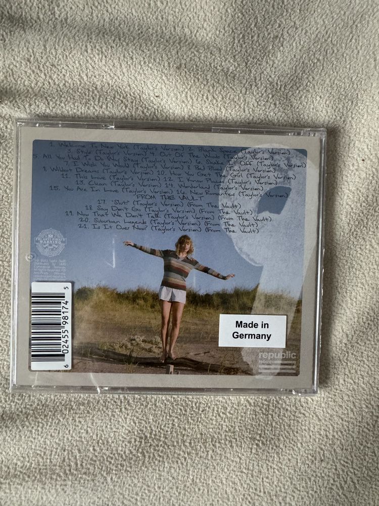 płyta CD Taylor Swift 1989 z polaroidami
