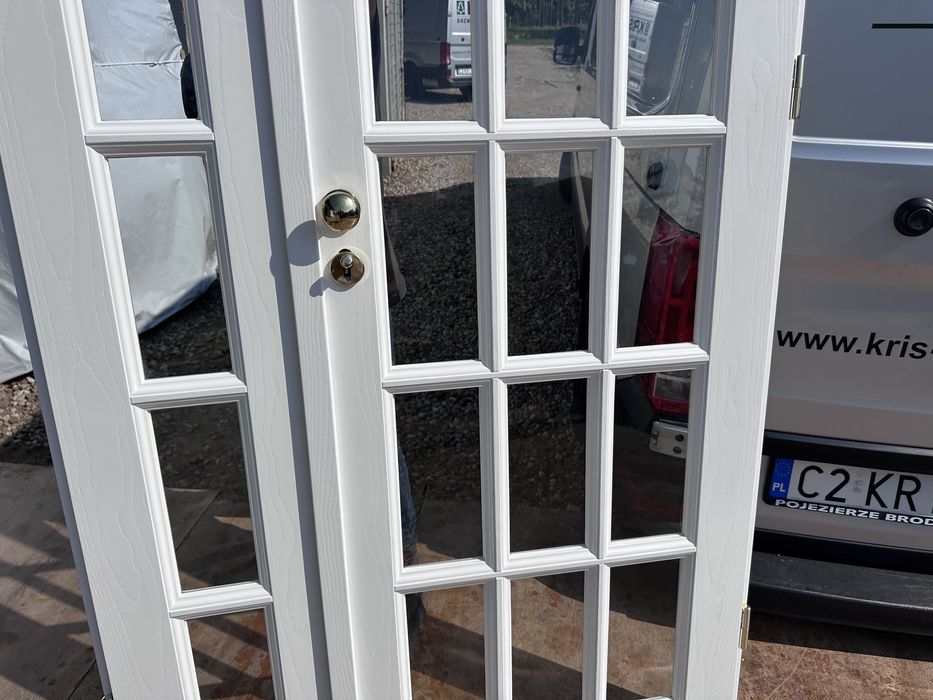 Drzwi wewnętrzne drewniane dwuskrzydłowe białe szpros Montaż c Polska