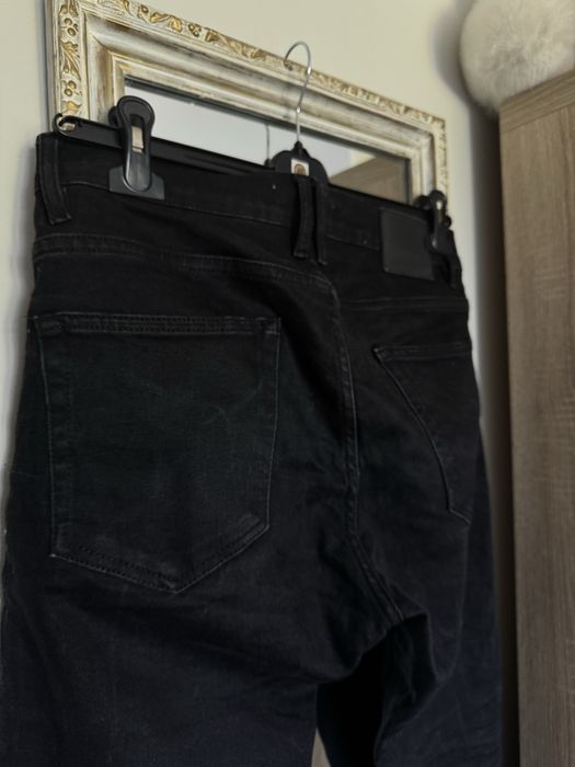 Czarne jeansy zara 40