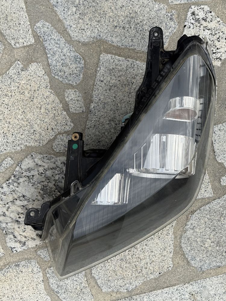 Farol esquerdo Opel Astra H