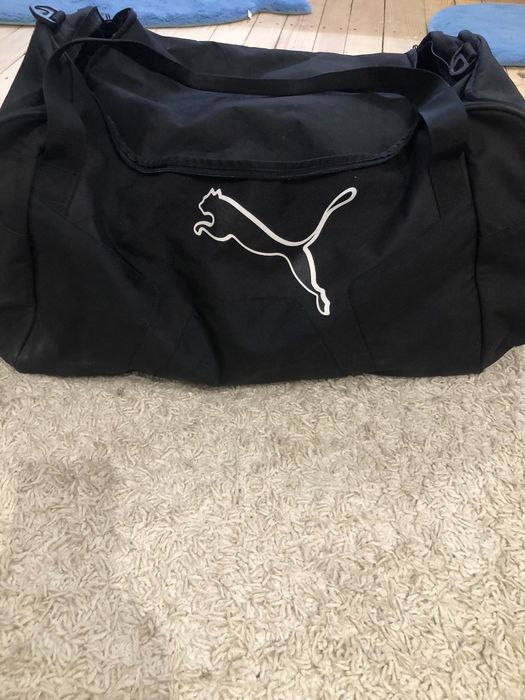 Фірмова дорожня сумка нова була лише один раз в користуванні