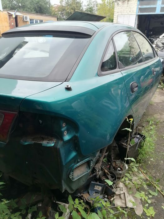 Мазда 323 ф крышка багажника