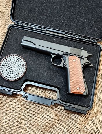 Пистолет Кольт 1911 коричневой