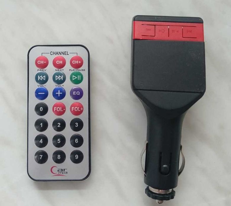 Продам FM-автомобильный адаптер с пультом