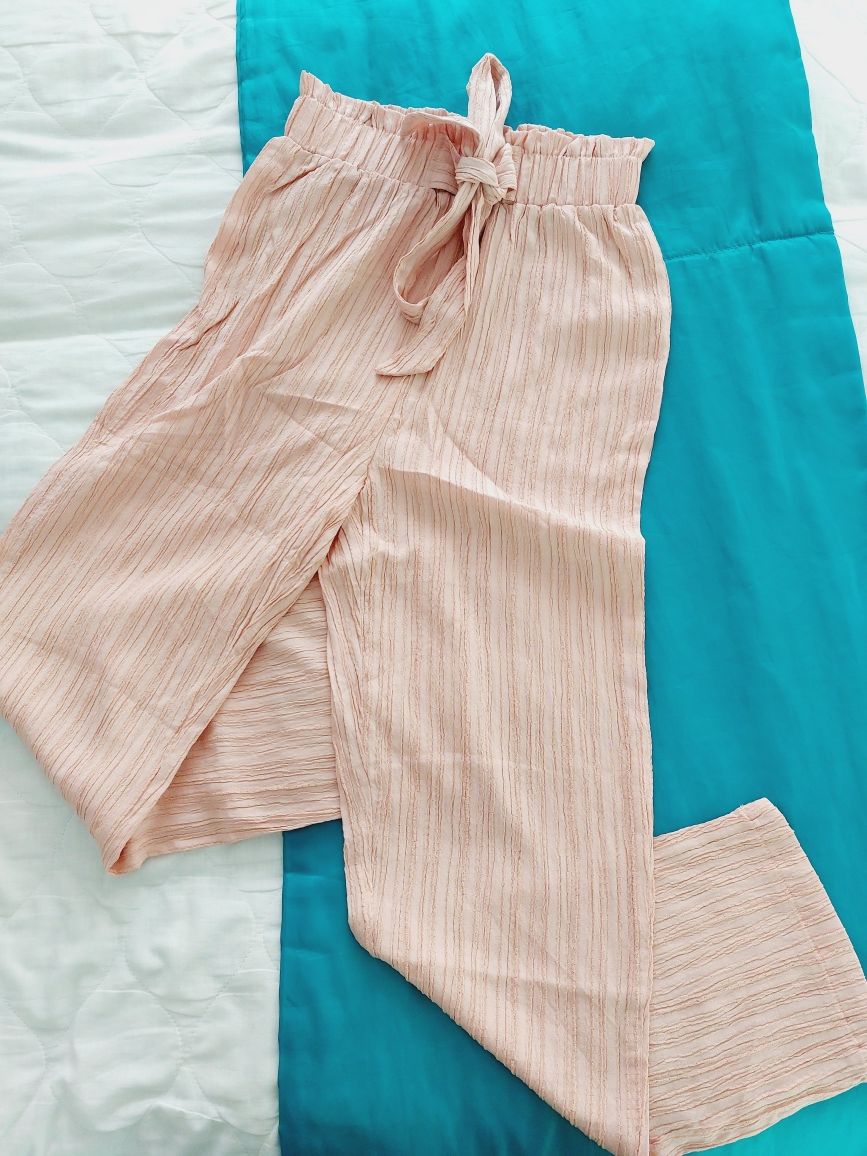Pudrowe różowe spodnie zwiewne materiałowe na lato szeroka nogawka xs