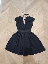 Sukienka rozkloszowana czarna brokatowa 34