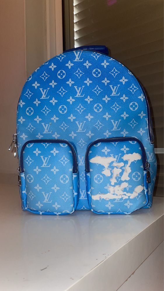 Mochila Louis Vuitton.