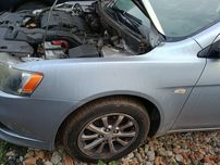 Błotnik drzwi przód klapa bagażnika Mitsubishi Lancer VIII A31