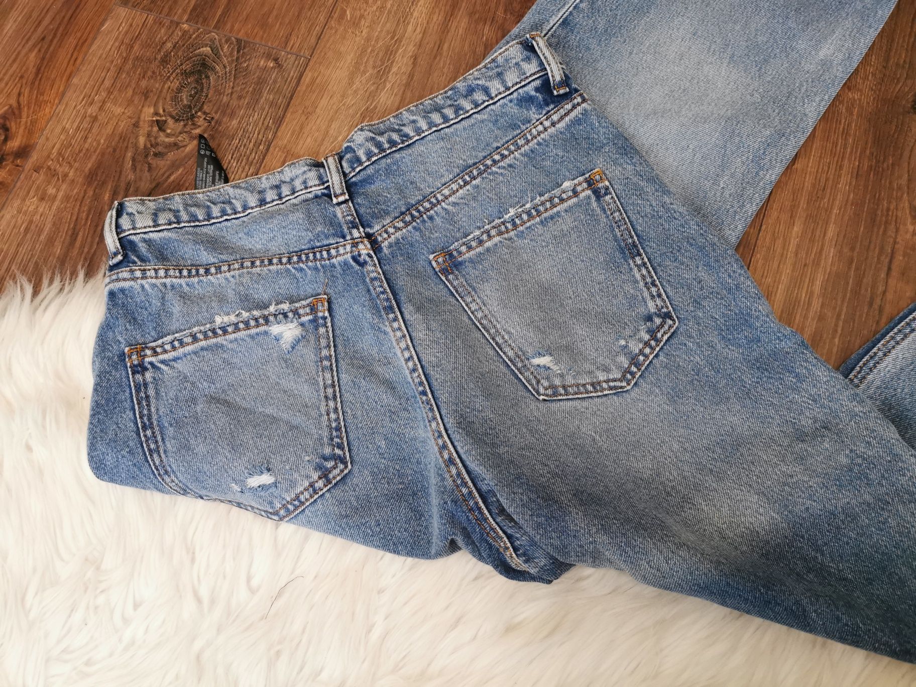 Spodnie dżinsowe jeansowe dżinsy jeansy z dziurami Zara L 40 proste