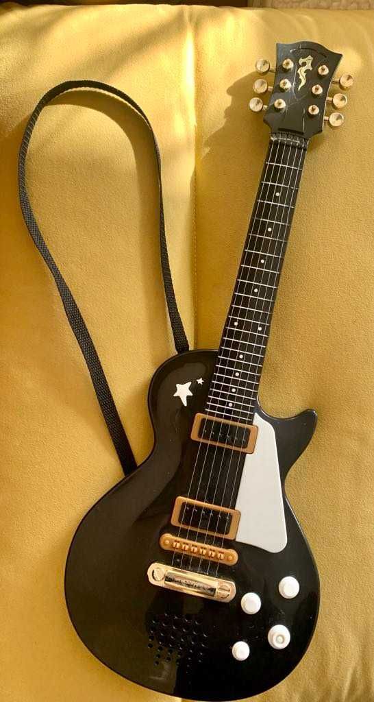 gitarka elektryczna SIMBA - instrumentalna zabawka - jest OK