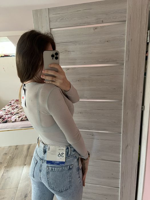 Eleganckie body z połyskiem długi rękaw z dekoltem V nowe