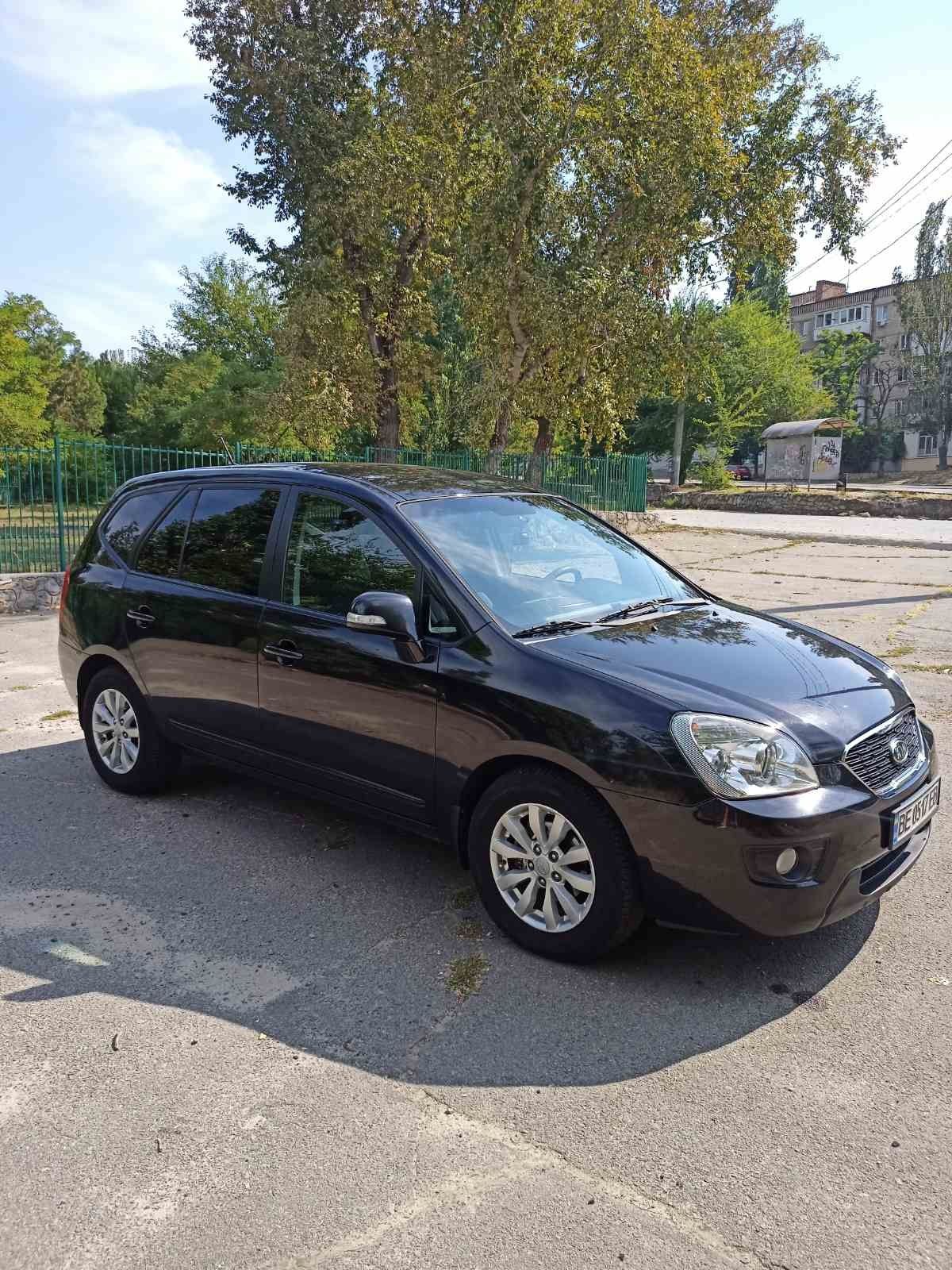 Продам машину KIA CARENS official