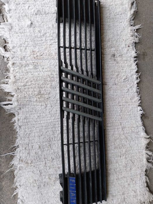 Farois e óticas Fiat Uno