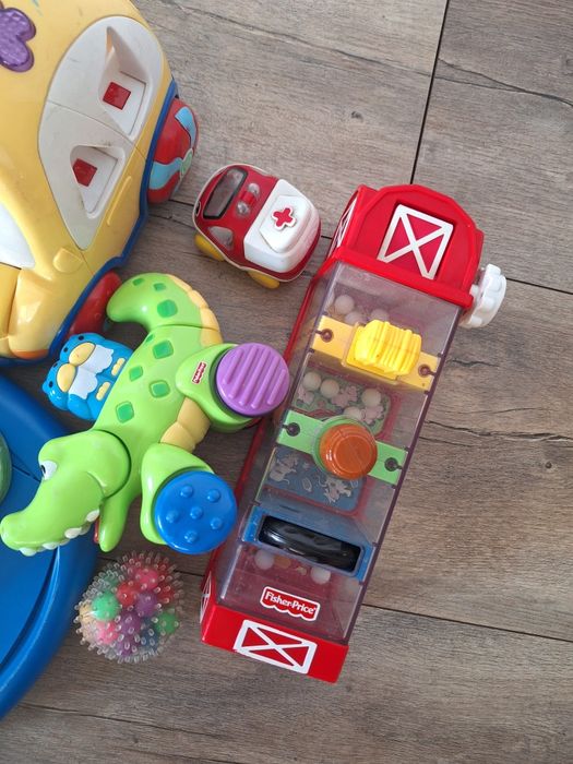 Paczka zabawek Vtech Fisher Price grające sensoryczne