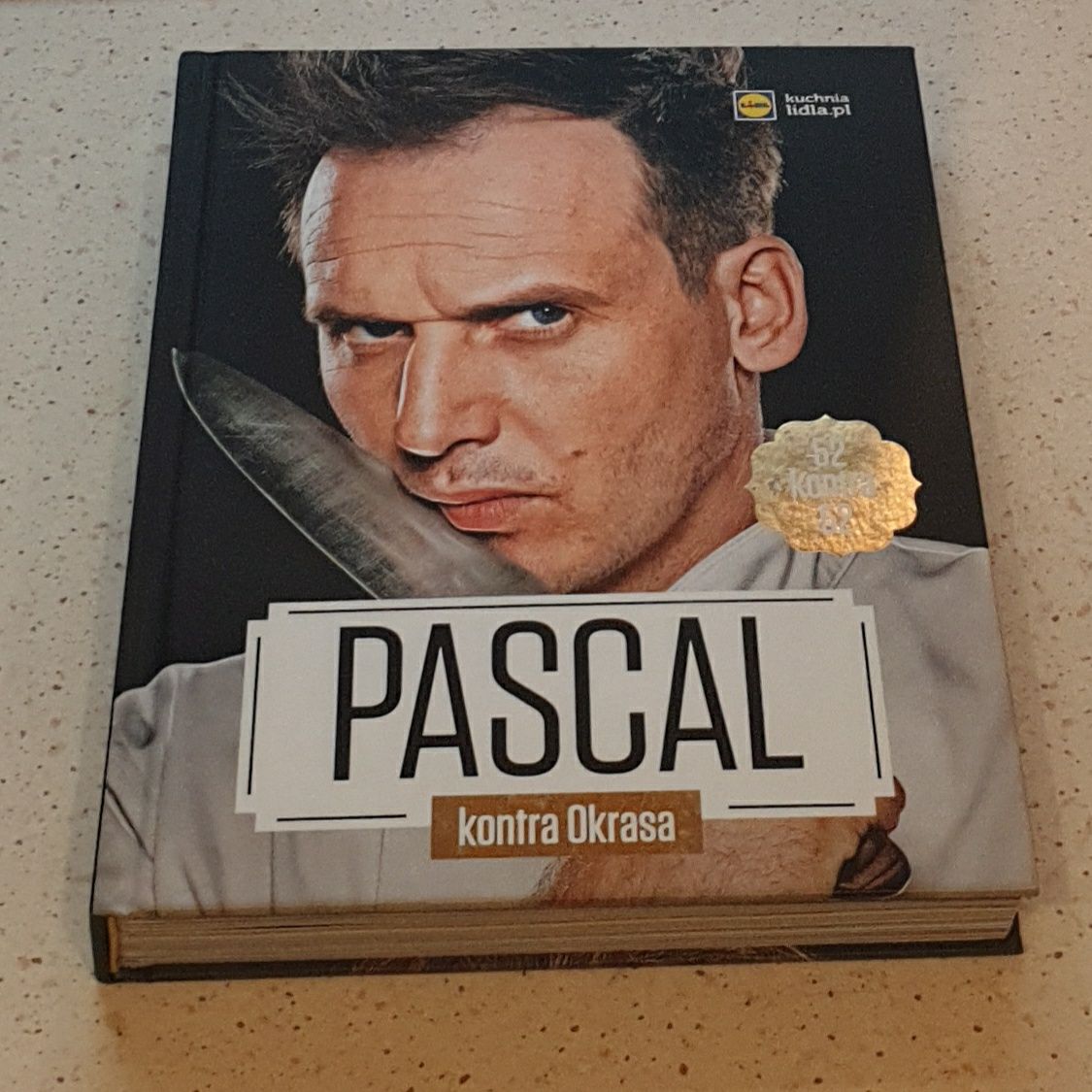 Książka okrasa kontra Pascal lidl 52 kontra 52