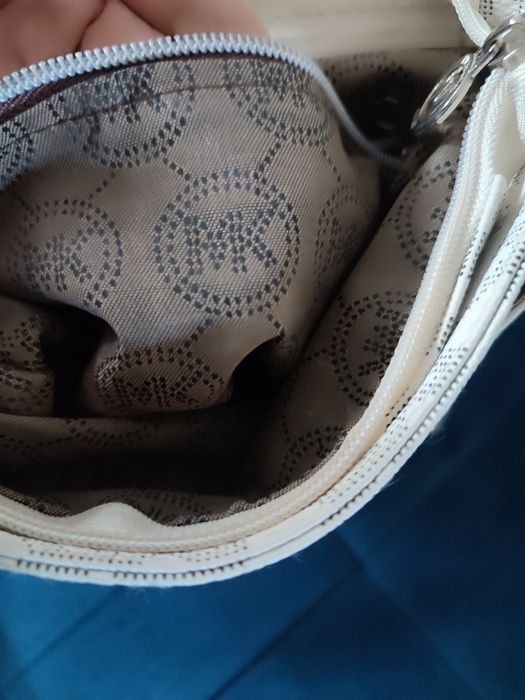 Listonoszka Michael Kors kremowa torebka shoperka