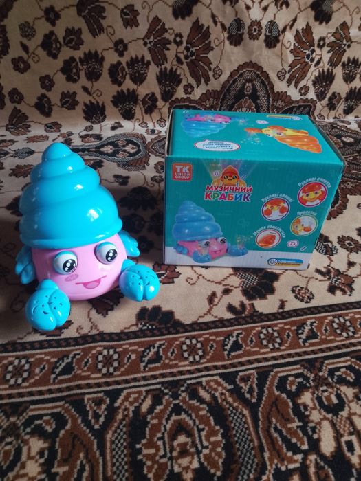 Детская музыкальная игрушка Крабик