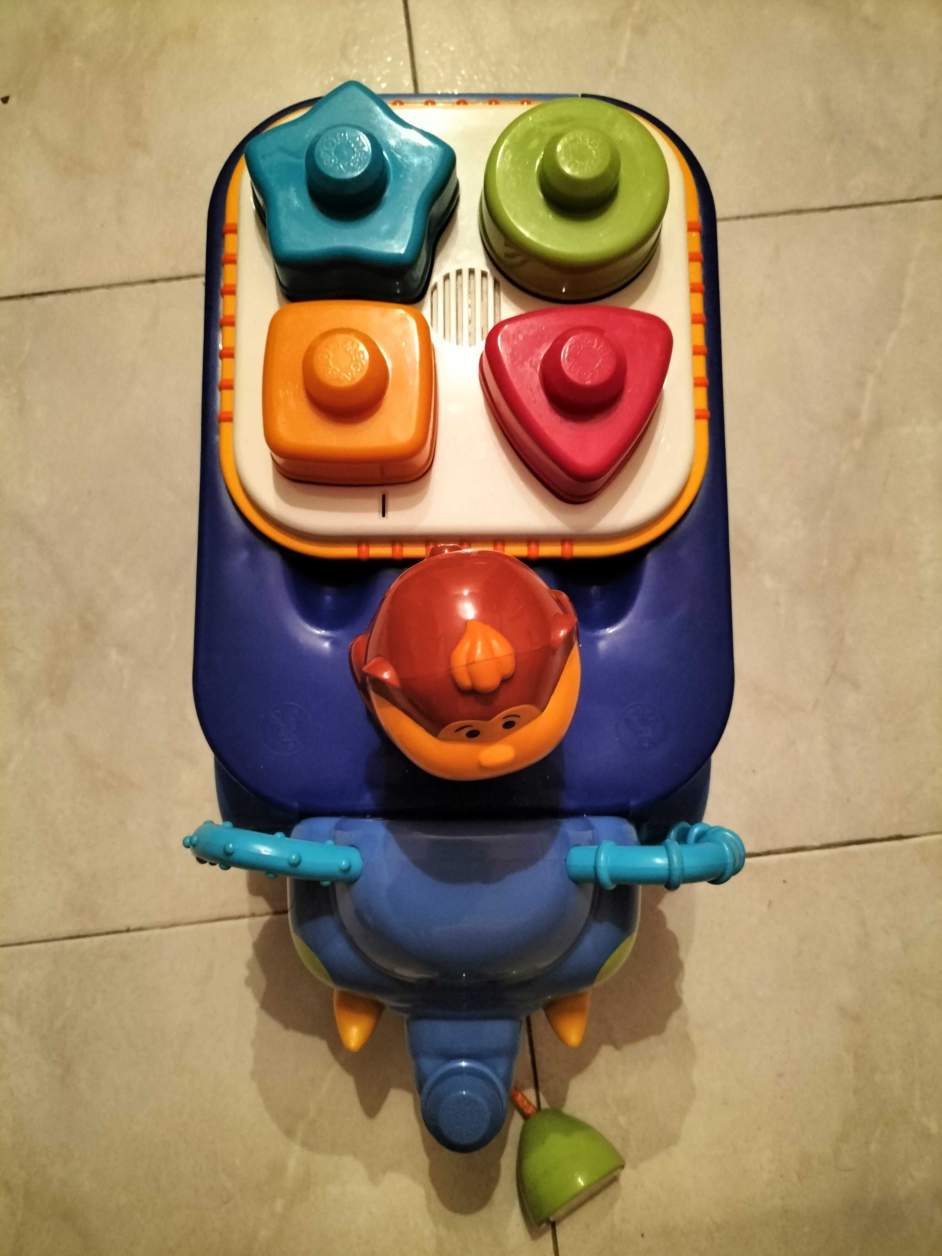 Brinquedo elefante musical com peças de encaixe