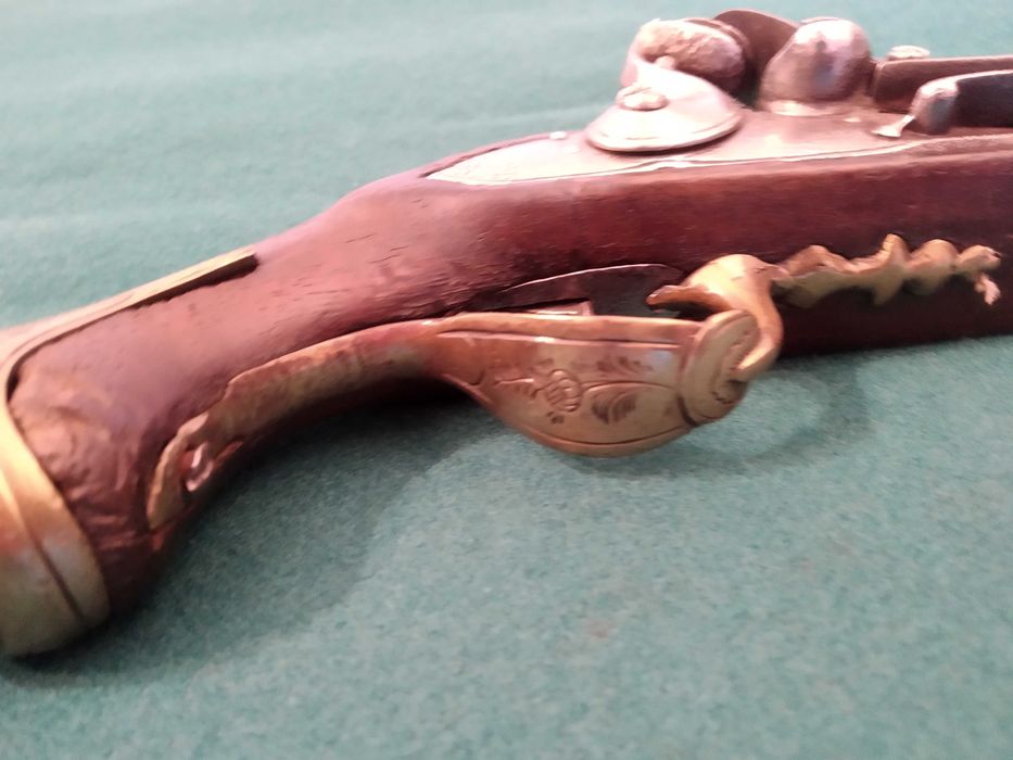 Pistola de pederneira  " de manteau" por volta de 1770