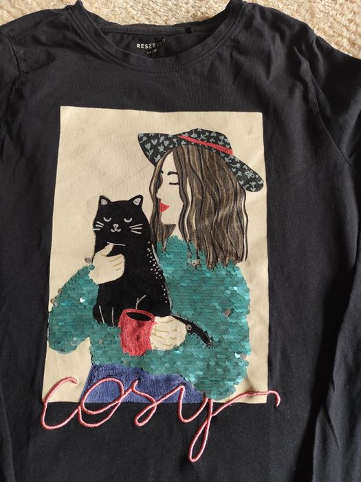 Reserved bluzka z cekinami "Dziewczyna z kotem"