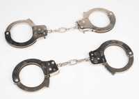 Іграшкові металеві поліцейські наручники, як справжні