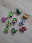 Przypinki charmsy piny jibbitz dinozaury do butów Crocs  10 sztuk