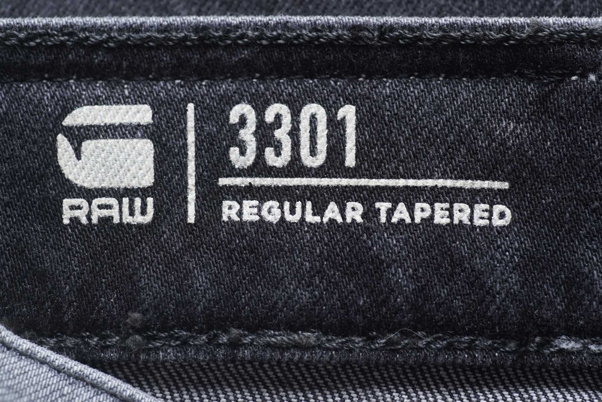 Мужские джинсы G-STAR RAW серого цвета (3301 Regular Tapered)