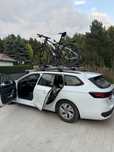 Thule belki dachowe relingi stojaki rowerowe 591 598 Passat b9 wynajem