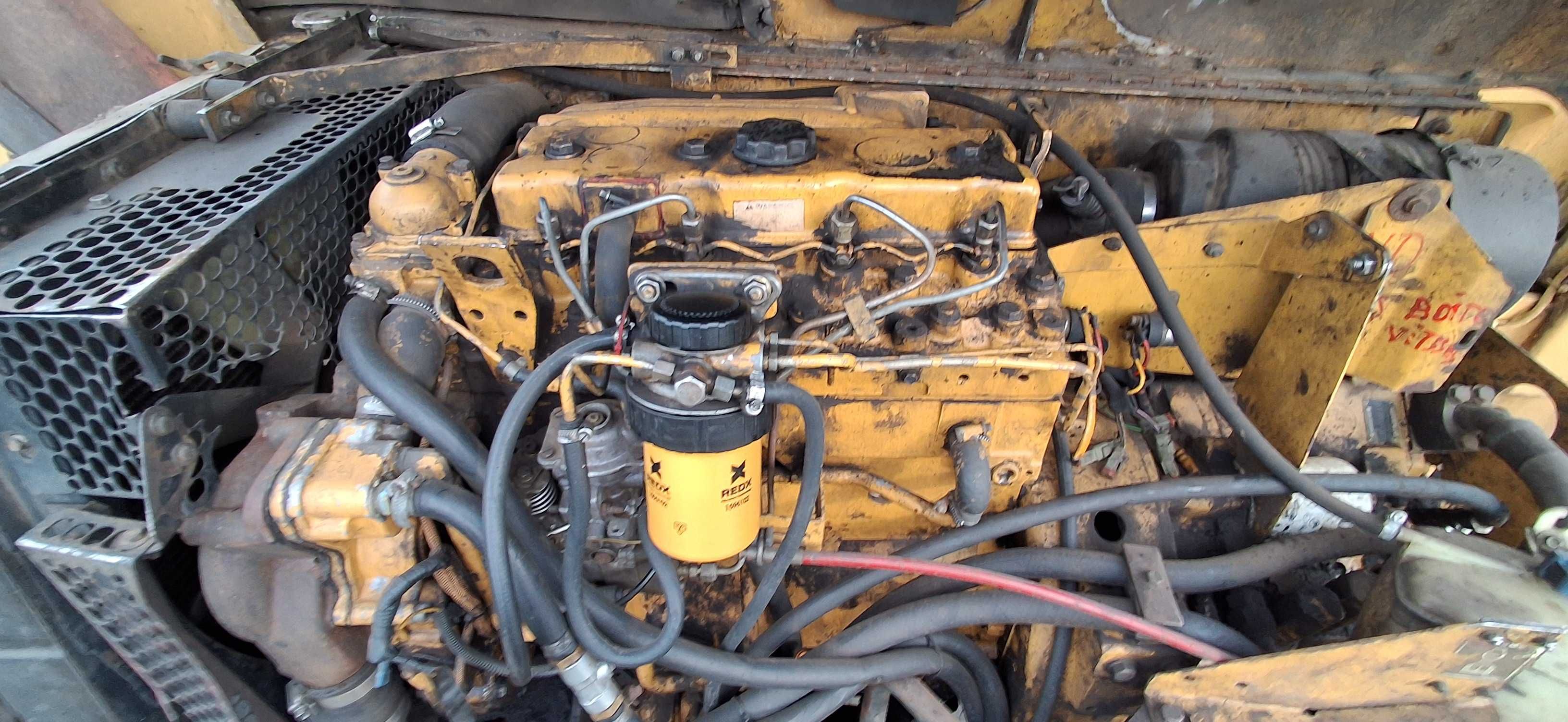 cat th82 Caterpillar teleskop ładowarka wysięg skrzynia biegów widły