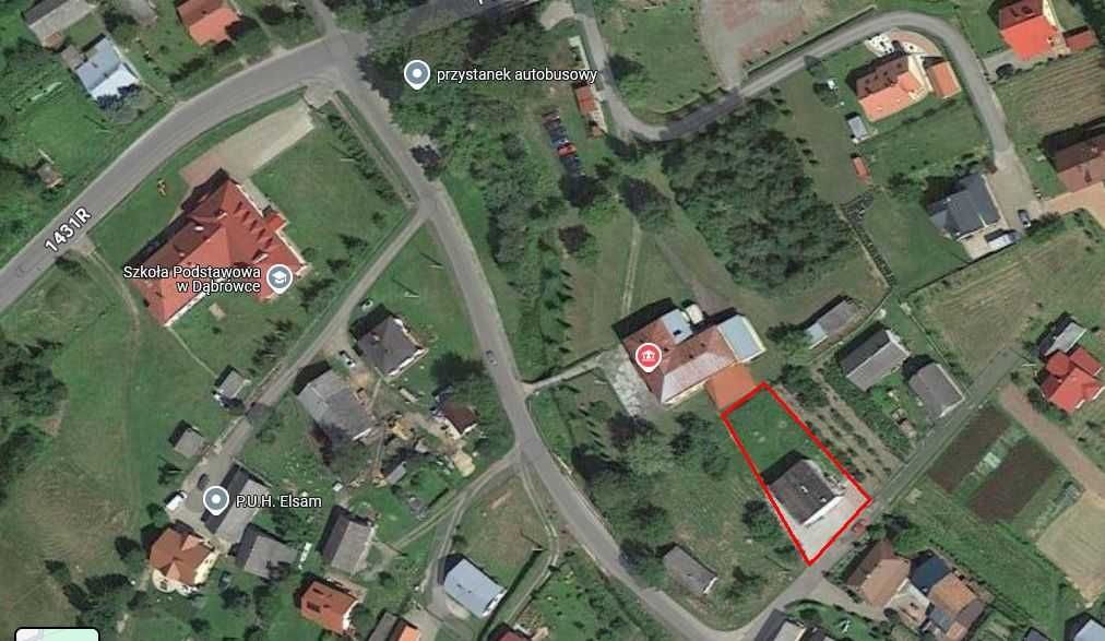 Budynek z działką 7,7 ar