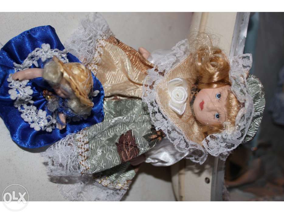 Brinquedos antigos - Carrinho de bébé + bonecas