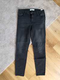 Spodnie jeansowe Reserved 38