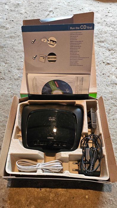 Linksys Cisco WAG120N router modem ADSL switch LAN WAN