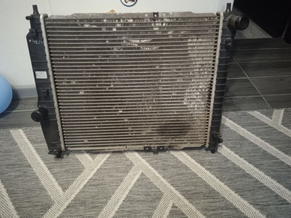 Продам радіатор Авео.